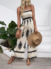 Smocked printed wide leg jumpsuit in cream with black floral embroidery