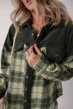 Olive green plaid shacket with long sleeve length, laid flat