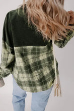 Olive green plaid shacket with long sleeve length, laid flat
