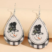 Snowman PU leather dangle earrings with top hat on plaid background