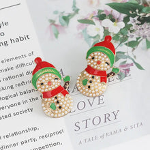Two festive snowman rhinestone alloy earrings with pearls and enamel