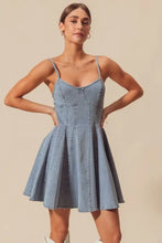 A light blue denim mini dress with thin straps and a flared skirt from so me a line fit and flare denim mini dress collection