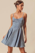 A light-wash denim mini dress with thin straps and a flared skirt from the SO ME A line fit and flare denim mini dress collection