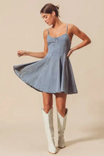 So me a line fit and flare denim mini dress in light wash with thin straps and a flared skirt design