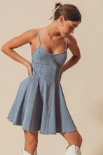 So me a line fit and flare light blue denim mini dress with thin straps and flared skirt perfect for casual wear