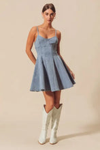 So Me a line fit and flare light-wash denim mini dress with thin straps and a flared skirt perfect for casual wear