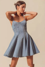Light blue denim mini dress with thin straps and a flared skirt in SO ME a line fit and flare denim mini dress