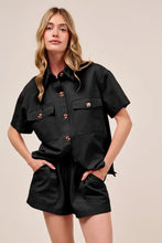 Black short-sleeved button-up in SO ME denim set with gold buttons, pockets