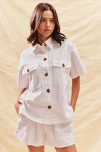 White short-sleeved button-up shirt in SO ME denim set with gold buttons, pockets