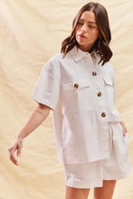 White short-sleeved button-up shirt in SO ME denim set with gold buttons