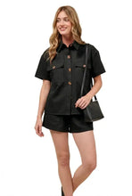 Black short-sleeved button-up in SO ME denim set with chest pockets