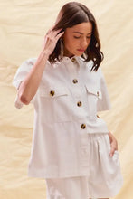 White short-sleeved button-up shirt in SO ME denim set with gold buttons