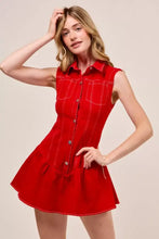 A vibrant red sleeveless collared game day mini dress in denim with button front and white stitching details