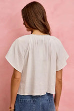 White cotton gauze blouse with lace trim pearl neckline and short flutter sleeves from so me collection