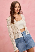 Cream-colored crochet knit long sleeves cardigan sweater with lace pattern