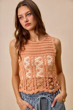 A peach-colored sleeveless crochet knitted lace sweater tank top with textured pattern and lace detailing by SO ME