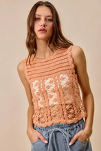 A peach-colored crochet knitted lace sleeveless top with open front design from SO ME lace sweater tank collection
