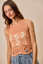 A peach-colored SO ME crochet knitted lace sleeveless sweater tank top with intricate lace patterns and scalloped hem