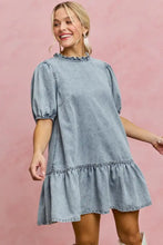 Light wash denim dress with puffed sleeves and ruffled hem in the SO ME Denim Short Sleeves Mini Tiered Dress style