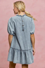 Light wash denim dress with puffed sleeves and button-back closure in so me denim short sleeves mini tiered dress style
