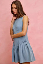 Soft blue denim mini dress with a fitted bodice and flared skirt in the SO ME Fit And Flare sleeveless style