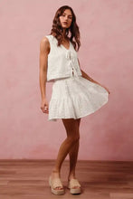 White eyelet lace tie front vest top with tiered mini skirt set