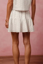 Eyelet lace tie front tiered mini skirt with perforated pattern