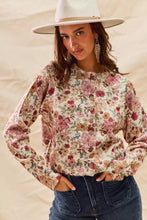 Woman in SO ME floral print button front sweater cardigan