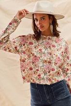 Woman in SO ME floral print button front sweater cardigan