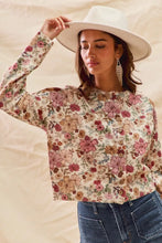 Woman in SO ME floral print button front sweater cardigan