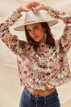 Woman in SO ME floral print button front sweater cardigan