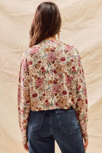 Woman in SO ME floral print button front sweater cardigan