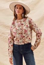 Woman in SO ME floral print button front sweater cardigan