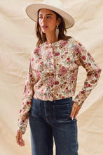 Woman in SO ME floral print button front sweater cardigan