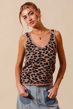 A tan and black leopard knitted lightweight tank top with scoop neckline featuring a lightweight v neck design
