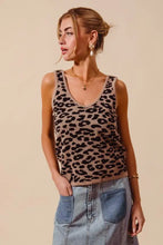A tan and black leopard knitted lightweight v neck tank top made of breathable knit fabric for casual wear