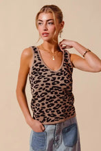 A tan and black leopard knitted lightweight v neck tank top made of knit material for stylish summer wear