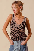 A taupe and black leopard knitted lightweight v neck tank top from SO ME with a knit fabric and sleeveless design