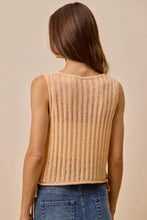Beige ribbed knit sleeveless low gauge pointelle sweater tank top in lightweight fabric for casual wear