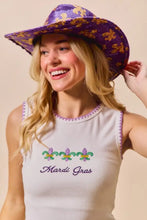 Purple sequined cowboy hat with gold fleur-de-lis pattern paired with mardi gras tank top with contrast blanket stitch