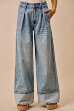 Light-wash mid rise plated wide-leg denim jean with high waist and rolled cuffs from so me collection