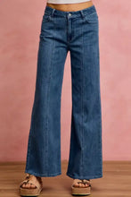 Blue denim high-waisted wide-leg SO ME mid rise stretch denim jeans with classic five-pocket design and frayed hems