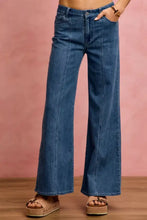 Blue denim jeans in mid rise stretch denim with high waist, wide-leg silhouette, and frayed hems by SO ME Seam Detail