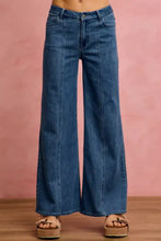 Blue denim stretch denim mid rise stretch wide-leg jeans with classic five-pocket design and frayed hems