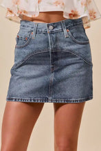 So me washed denim mini skirt with curved front seam and classic five-pocket design in blue washed denim