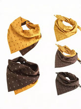 Yellow and brown patterned soft pet scarf with small cross motifs
