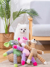 Soft plush animal knitted dog toy with tan body and pink feet