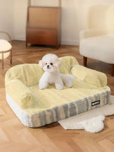 Cozy light yellow and gray plush pet bed with soft white trim