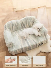 Soft plush pet bed with gray white striped cozy cushioned sofa design