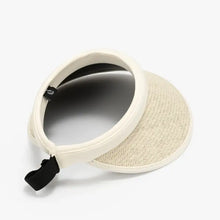 Light-colored straw solid adjustable weave visor with black strap